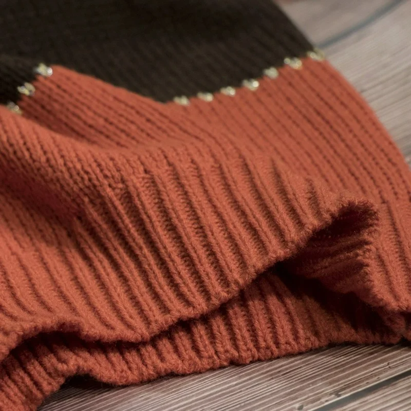 Christine Brewer Fiona women's knit sweater featuring colorful striped pattern, long sleeves, and relaxed fit.