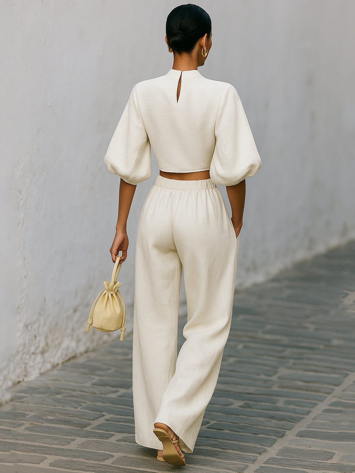 Cream textured lantern sleeve two-piece set for women featuring pants and a stylish top by Christine Brewer.