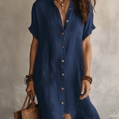 Black linen relaxed midi dress for women by Christine Brewer, featuring a flowy silhouette and casual elegance.