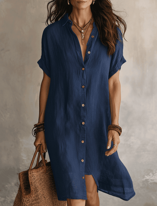 Black linen relaxed midi dress for women by Christine Brewer, featuring a flowy silhouette and casual elegance.