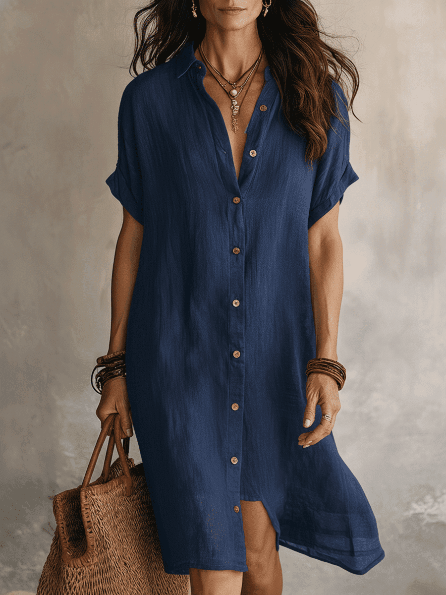 Black linen relaxed midi dress for women by Christine Brewer, featuring a flowy silhouette and casual elegance.