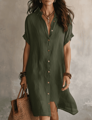 Black linen relaxed midi dress for women by Christine Brewer, featuring a flowy silhouette and comfortable fit.