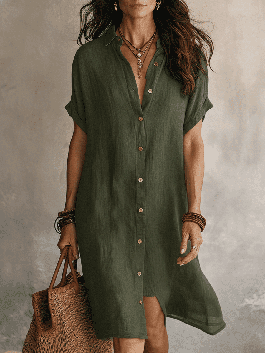 Black linen relaxed midi dress for women by Christine Brewer, featuring a flowy silhouette and comfortable fit.