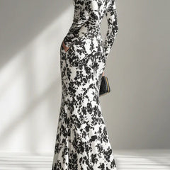 Black and white color-blocked printed long-sleeve maxi dress with pocket and pleated details by Christine Brewer