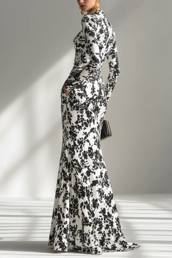 Black and white color-blocked printed long-sleeve maxi dress with pocket and pleated details by Christine Brewer
