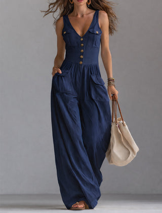 White sleeveless wide-leg jumpsuit with patch pockets for women by Christine Brewer, featuring a relaxed fit and stylish design.