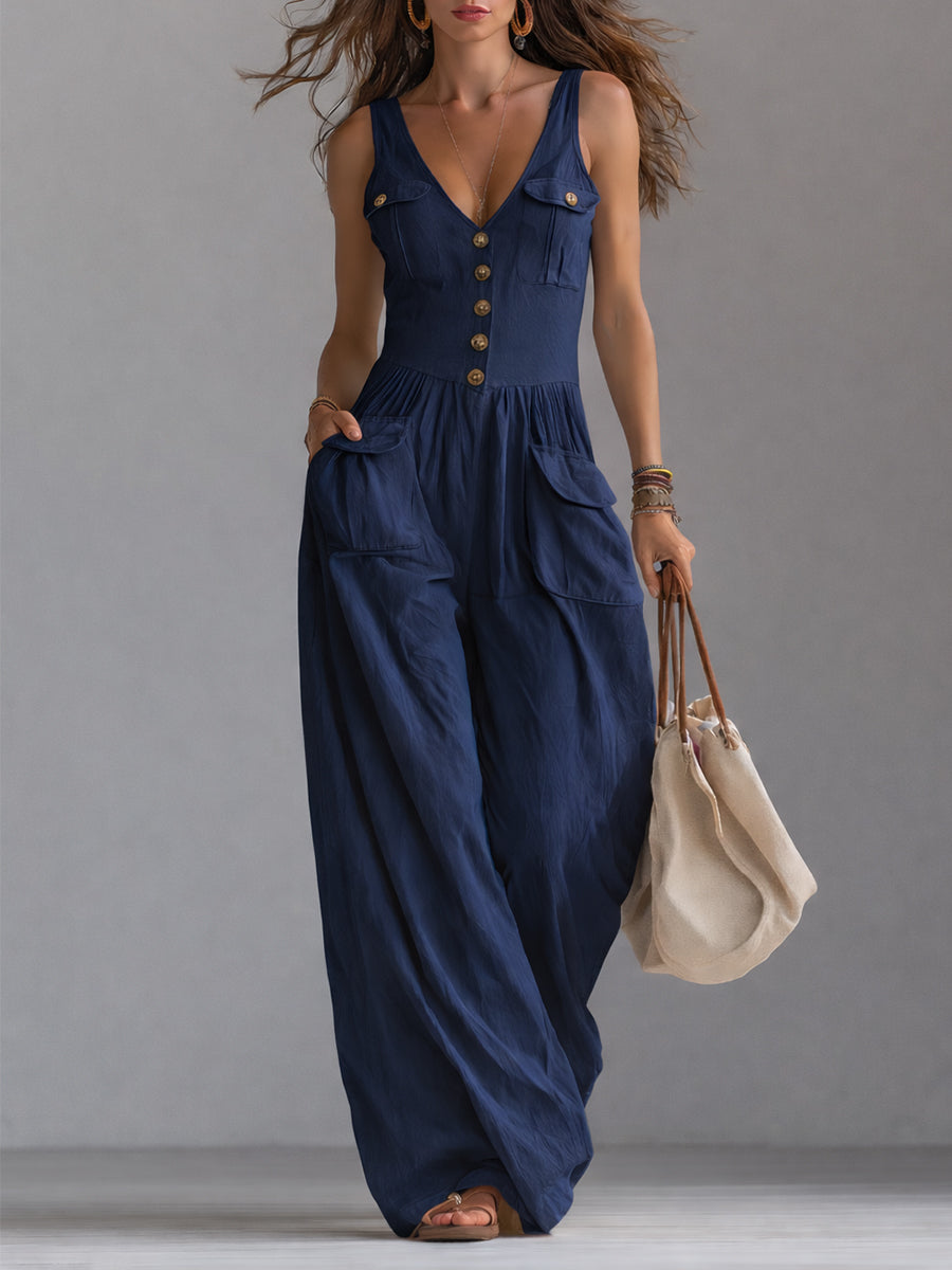 White sleeveless wide-leg jumpsuit with patch pockets for women by Christine Brewer, featuring a relaxed fit and stylish design.