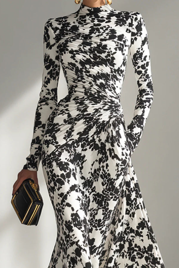 Black and white color-blocked printed long-sleeve maxi dress with pockets, slim fit, pleated design by Christine Brewer.