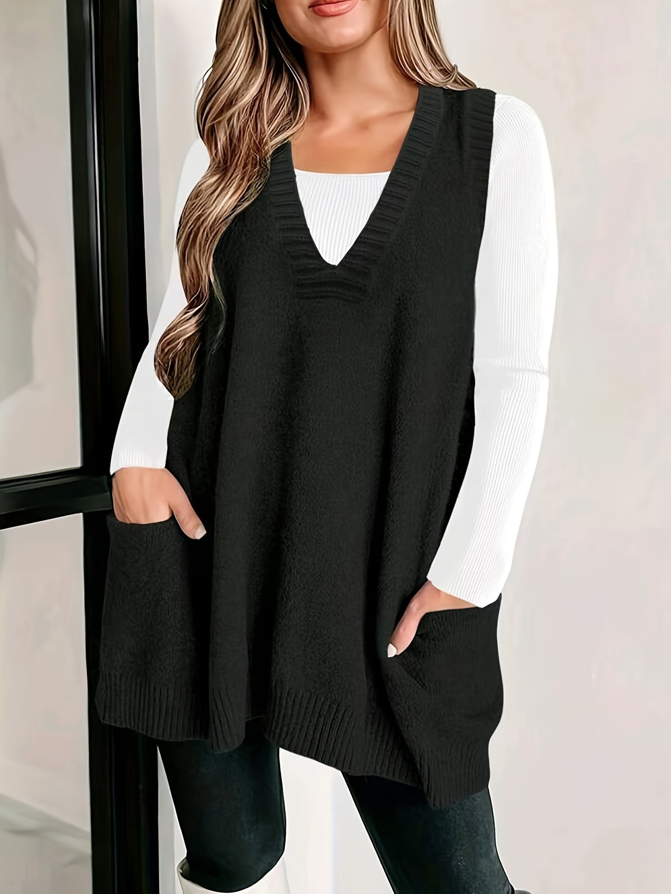 Kelly V-neck sleeveless knit sweater vest for women by Christine Brewer, shown in a close-up of the soft, ribbed fabric.