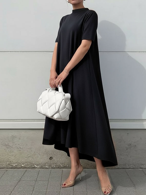 White high-low maxi dress with short sleeves from Christine Brewer, featuring a solid color and flowing fabric.