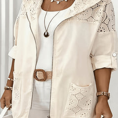 Women’s Iris hooded jacket by Christine Brewer, featuring a stylish outerwear design with a hood and comfortable fit.