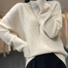 Christine Brewer Selena cable knit turtleneck sweater for women, featuring a cozy, textured knit design and classic turtleneck fit.