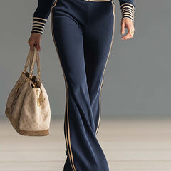 Dark blue knitted hooded zip-up v-neck jumpsuit for women, featuring a comfortable fit with a stylish hood and front zipper.