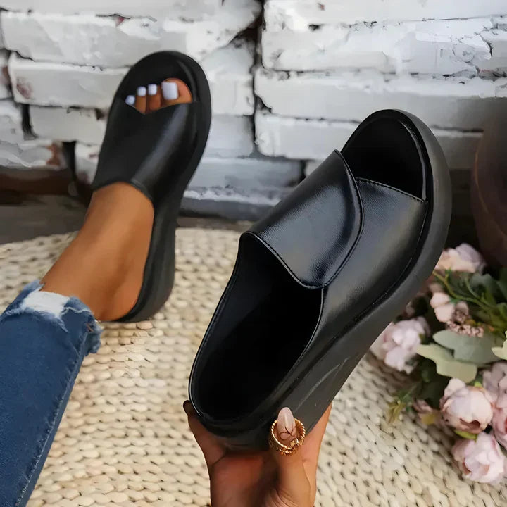 Comfortable Christine Brewer Eliza orthopedic slip-on wedge sandals for women with supportive design and casual style.