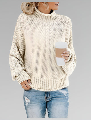 Amy Winifred ribbed orange women's sweater by Christine Brewer, showcasing the textured knit and fitted style.