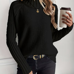 Christine Brewer Rosalind knit sweater for women, cozy knitwear with a textured pattern and long sleeves, in soft neutral tones.