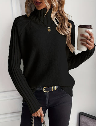 Christine Brewer Rosalind knit sweater for women, cozy knitwear with a textured pattern and long sleeves, in soft neutral tones.