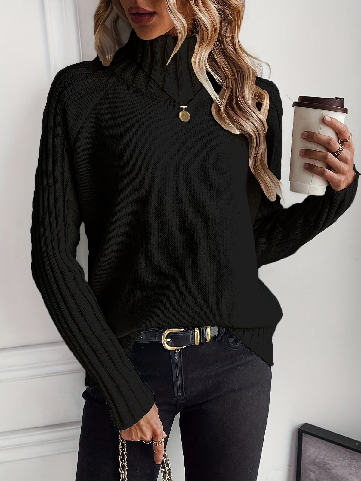 Christine Brewer Rosalind knit sweater for women, cozy knitwear with a textured pattern and long sleeves, in soft neutral tones.