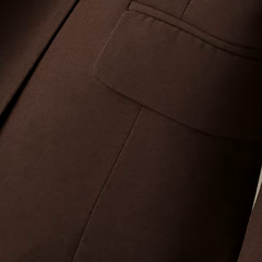 Tailored women's blazer from Christine Brewer featuring a fitted design, lapel collar, and classic style for professional or casual wear.