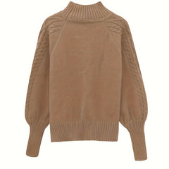 Christine Brewer Mila cable knit high neck sweater for women, featuring a cozy high neckline and textured knit pattern.