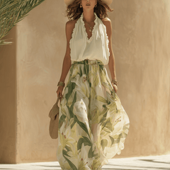 White flowing maxi dress for women by Christine Brewer, lightweight fabric with a relaxed fit and elegant drape.