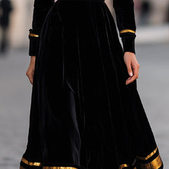 Elegant velvet midi dress with gold trim from Christine Brewer, showcasing a fitted silhouette and stylish details.