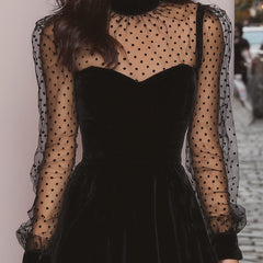 Elegant velvet evening dress by Christine Brewer featuring a fitted silhouette and stylish neckline, perfect for formal occasions.