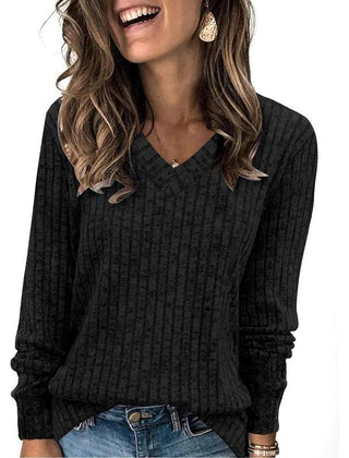 Christine Brewer Susanna oversized women's V-neck sweater in soft knit, featuring a relaxed fit and classic V-neck design.