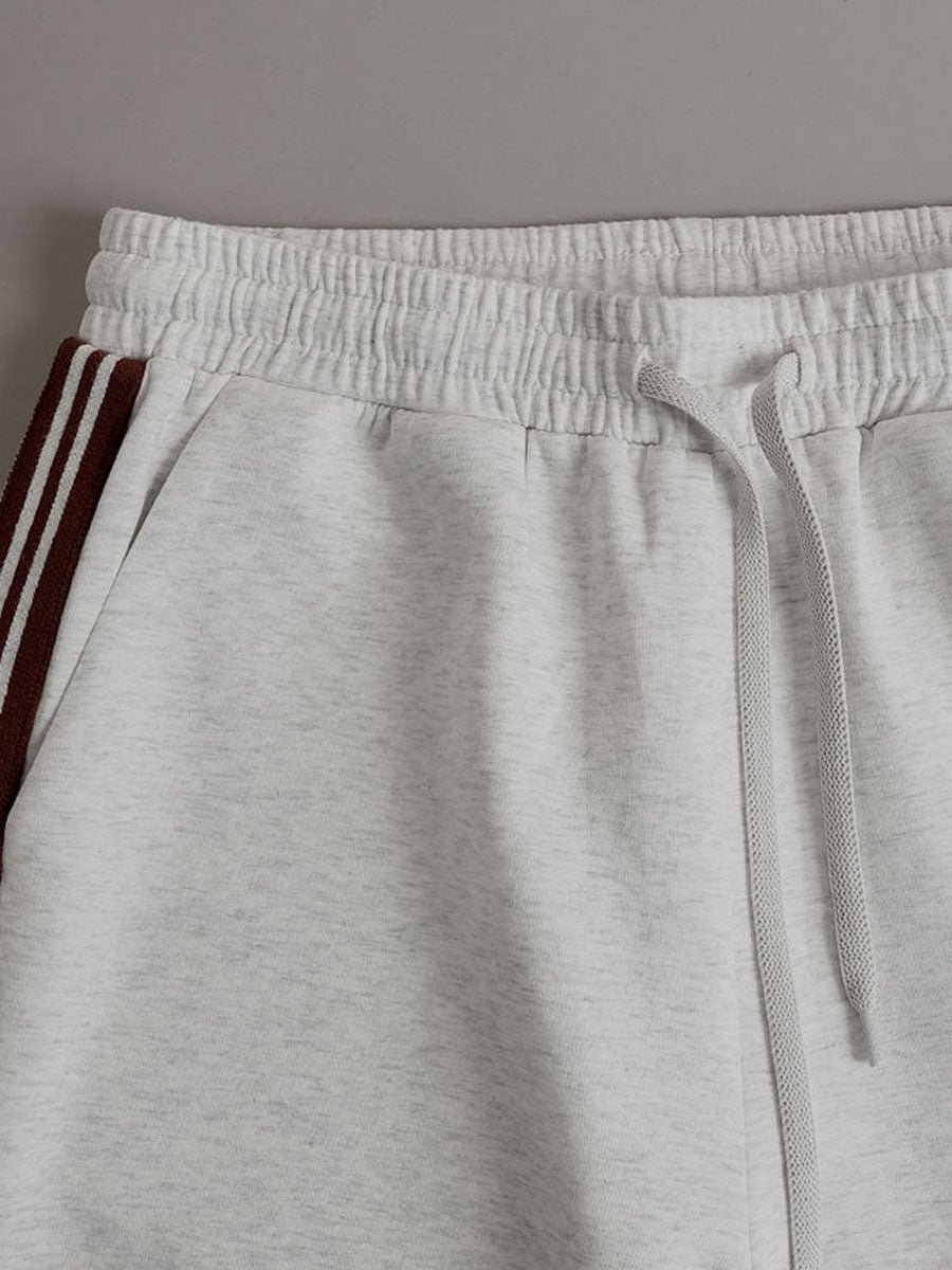 Retro sporty grey and white sleeveless sweatshirt and shorts set by Christine Brewer, perfect for casual activewear.