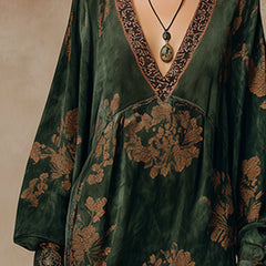 Green faux suede tassel maxi dress for women by Christine Brewer, featuring a flowing silhouette and tassel details.