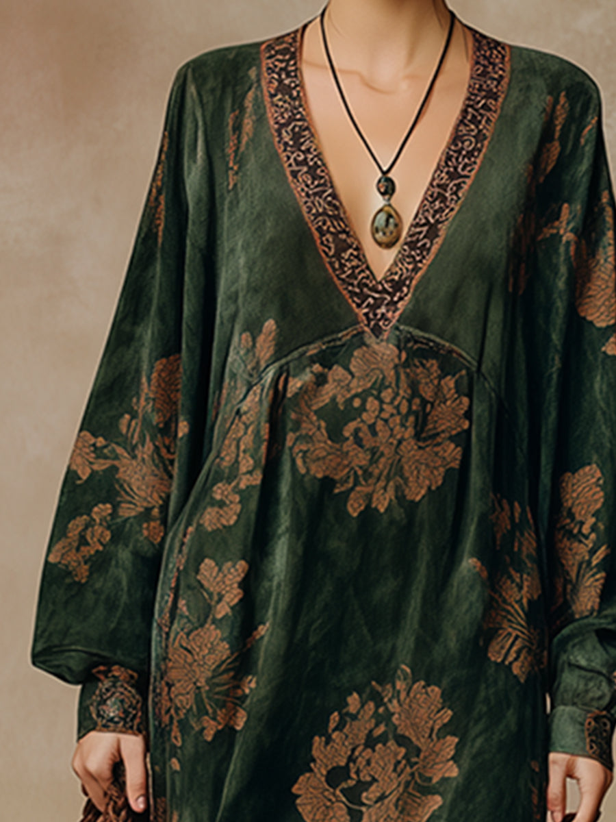 Green faux suede tassel maxi dress for women by Christine Brewer, featuring a flowing silhouette and tassel details.