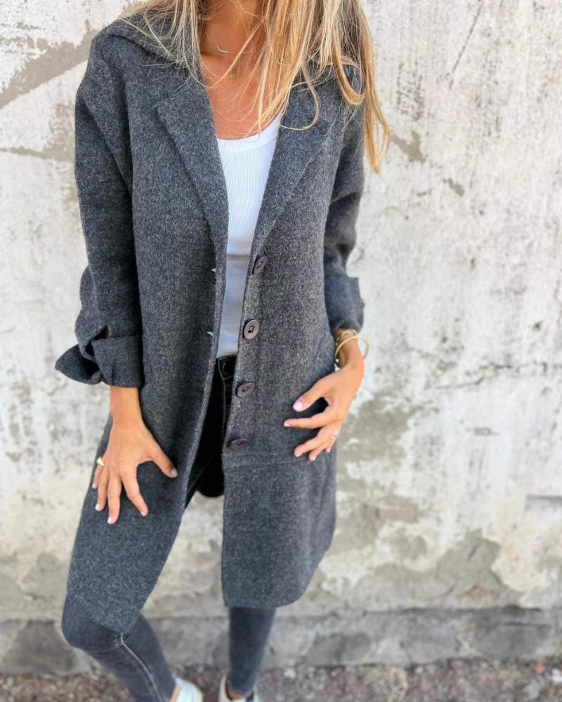 Longline knit top for women by Christine Brewer, featuring a cozy, stylish design with a fitted silhouette and soft fabric.