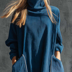 Blue corduroy midi dress by Christine Brewer, casual style with fitted bodice and flared skirt, displayed on a hanger.