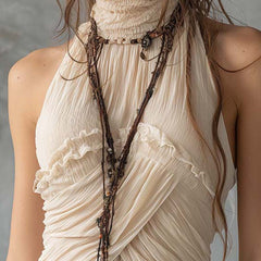Ivory sleeveless chiffon halter neck blouse with pleated design for women, by Christine Brewer