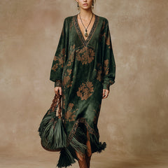 Green faux suede tassel maxi dress for women by Christine Brewer, featuring a flowing silhouette and stylish tassel details.