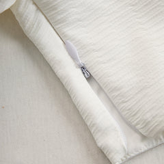 Cream textured lantern sleeve two-piece set for women by Christine Brewer, featuring stylish pants and a matching top.
