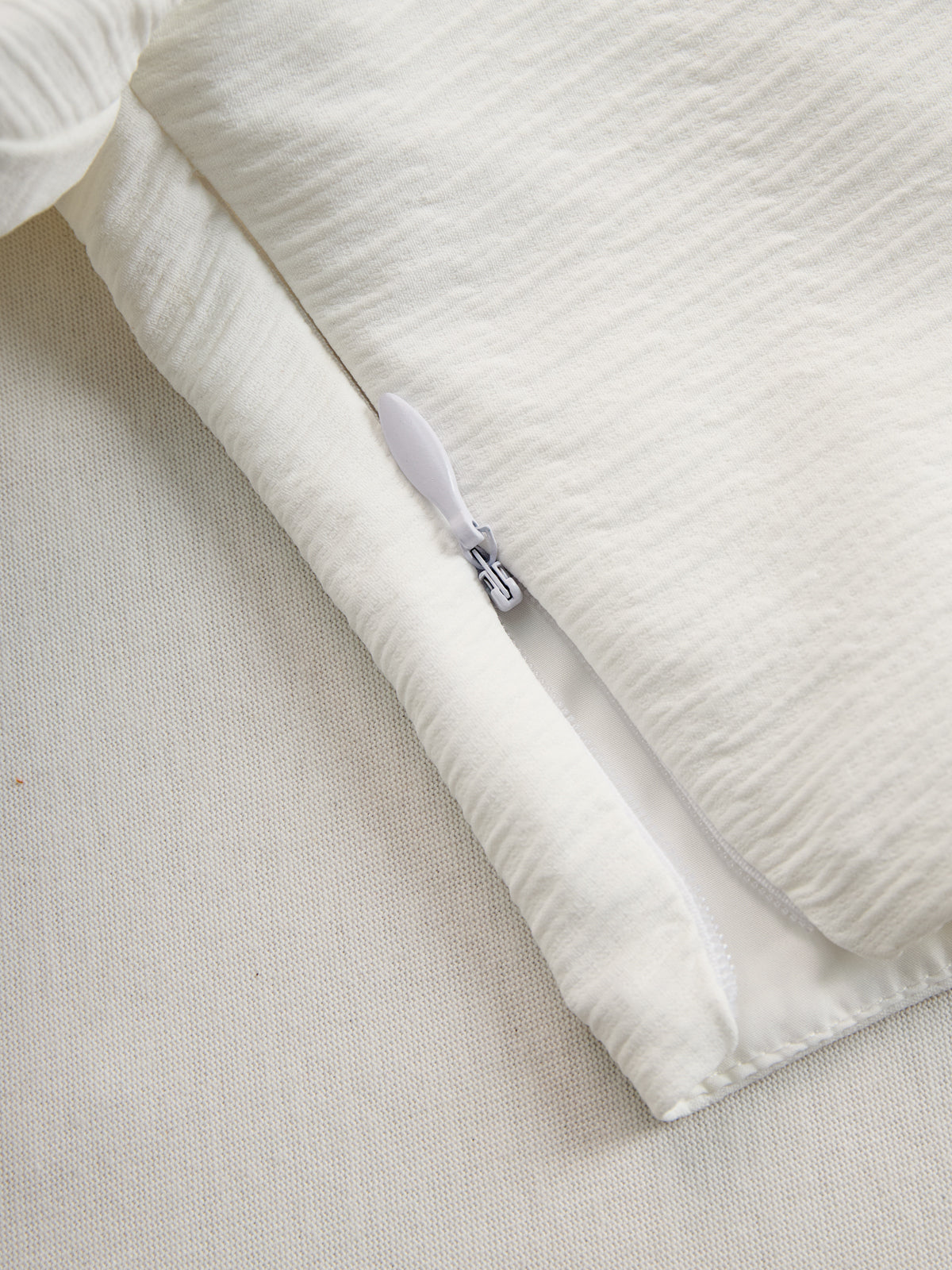 Cream textured lantern sleeve two-piece set for women by Christine Brewer, featuring stylish pants and a matching top.