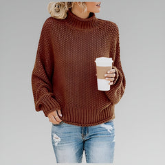 Amy Winifred ribbed orange sweater for women by Christine Brewer, featuring a close-up of the textured knit and fitted style.