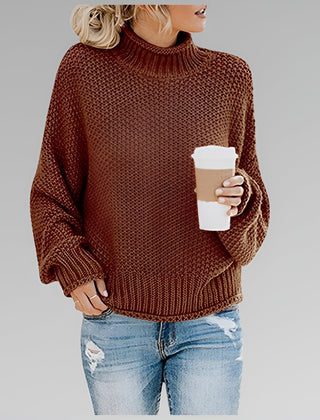 Amy Winifred ribbed orange sweater for women by Christine Brewer, featuring a close-up of the textured knit and fitted style.