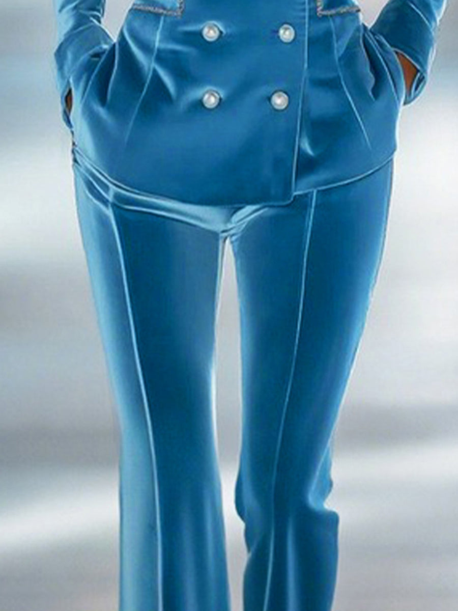 Blue loose velvet flared women's trousers by Christine Brewer, showcasing relaxed fit and stylish flare design.