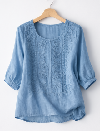 White floral blouse for women from Christine Brewer's Isla collection, featuring delicate floral patterns and a stylish fit.