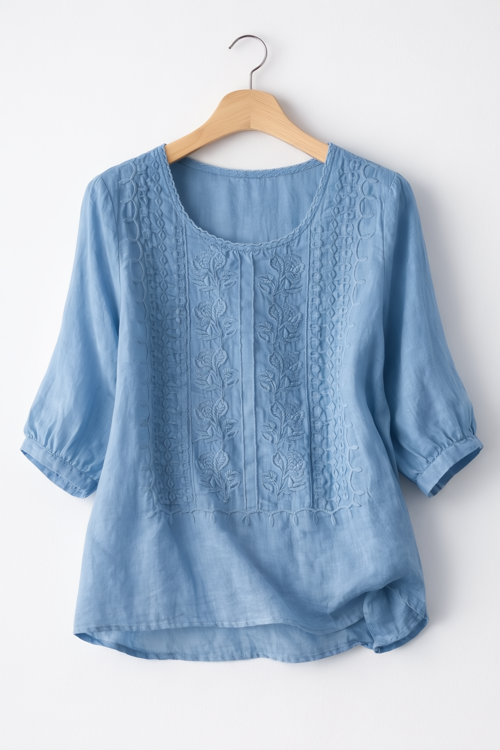 White floral blouse for women from Christine Brewer's Isla collection, featuring delicate floral patterns and a stylish fit.