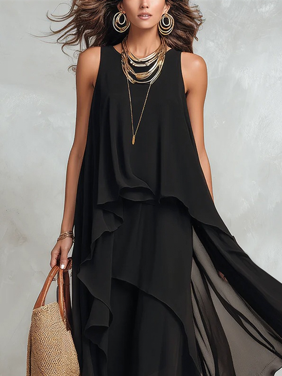 Black layered chiffon maxi dress by Christine Brewer featuring bohemian style and flowing fabric for elegant, relaxed wear.