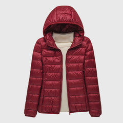 Lightweight quilted jacket named Lily by Christine Brewer, shown in a sleek, ultra-light design with subtle quilting details.