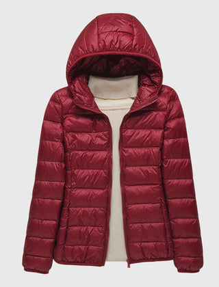 Lightweight quilted jacket named Lily by Christine Brewer, shown in a sleek, ultra-light design with subtle quilting details.