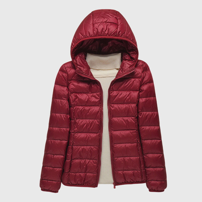 Lightweight quilted jacket named Lily by Christine Brewer, shown in a sleek, ultra-light design with subtle quilting details.