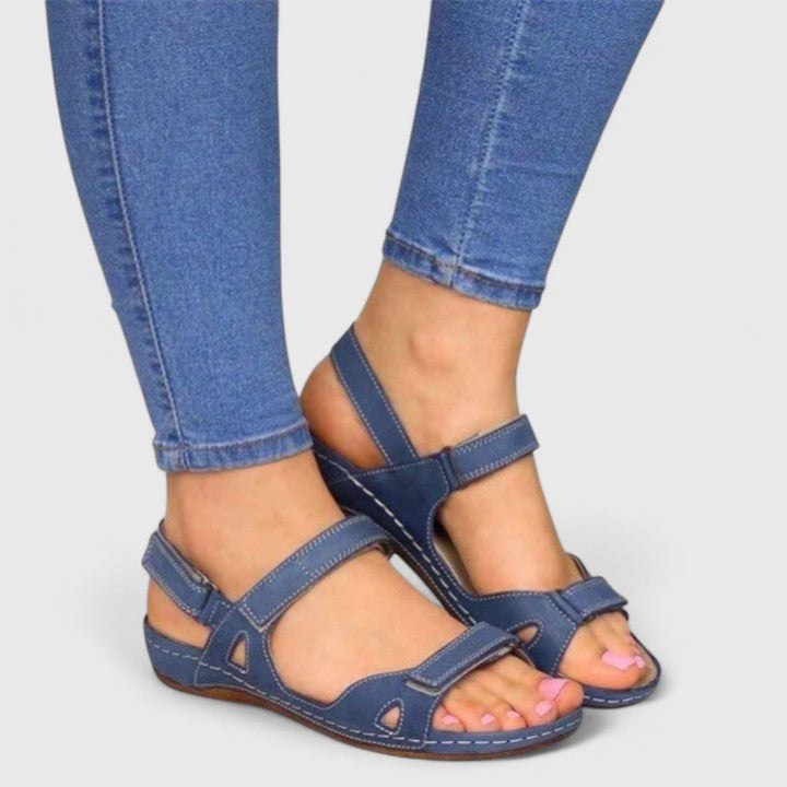 Open-toe ankle-strap sandals for women by Christine Brewer, featuring stylish design and comfortable fit.