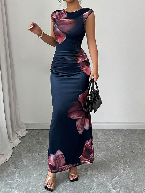 White Christine Brewer bodycon sleeveless maxi dress with contrast color flower print and round neckline, perfect for elegant occasions.
