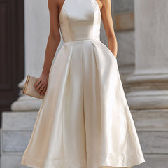 Christine Brewer halter-neck pleated midi dress for women, stylish dress with flowing pleats and a flattering fit.