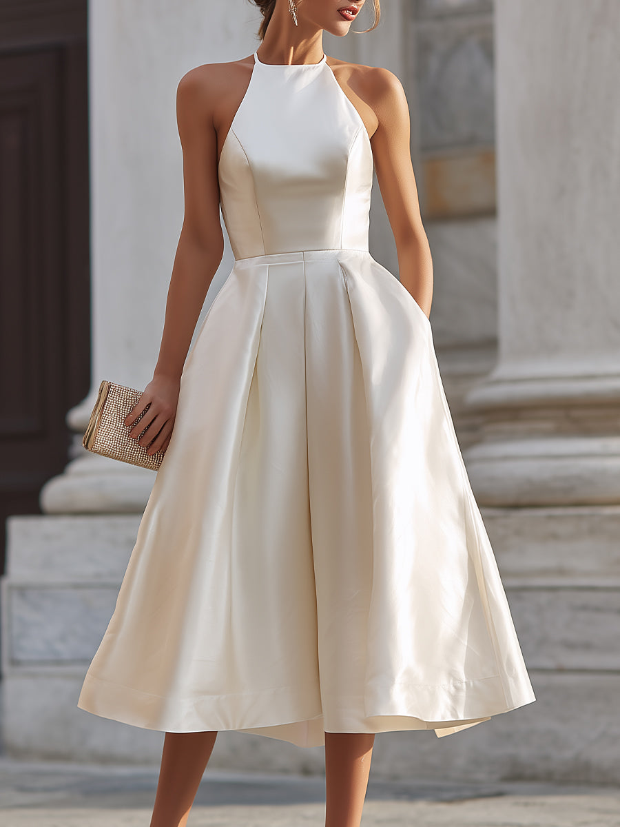Christine Brewer halter-neck pleated midi dress for women, stylish dress with flowing pleats and a flattering fit.
